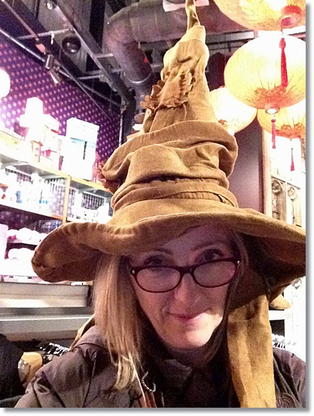 Hogwarts at Christmas: Mummy tries on the sorting hat