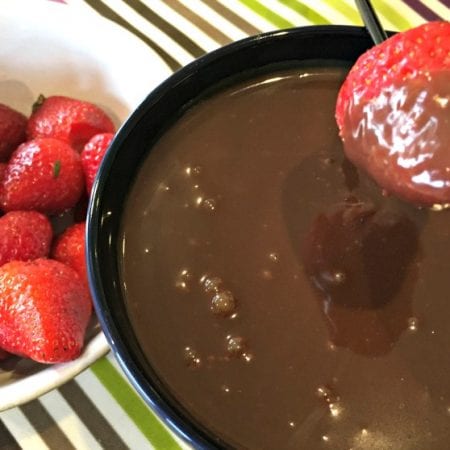 Easy strawberry recipes: this chocolate fondue dip is always a hit with kids, and is so quick to make