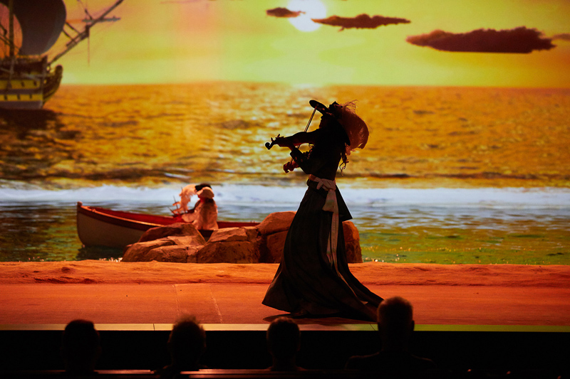 The ocean rolls onto the stage in Le Dernier Panache at Puy du Fou