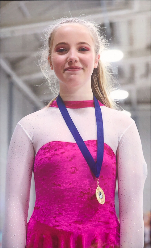 Gold skating medal with Omnipod