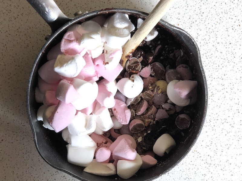 Mix marshamallows and Mini Eggs into melted chocolate and butter for a Mini Egg Rocky Road recipe